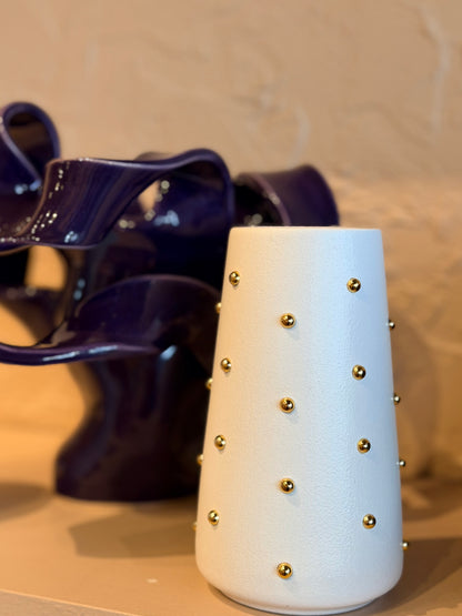 P. Grunsfeld Studded 6-inch vase by The Vault Creative with a textured, studded surface and a sleek, modern design.