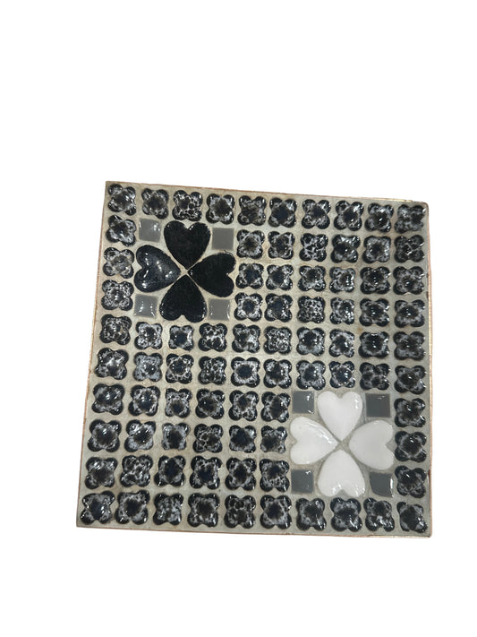 Black and white mosaic tabletop tray by The Vault Creative, featuring intricate vintage geometric tile patterns.