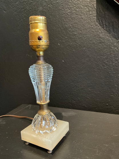 Vintage crystal lamps by The Vault Creative featuring ornate glass designs and elegant metal bases.