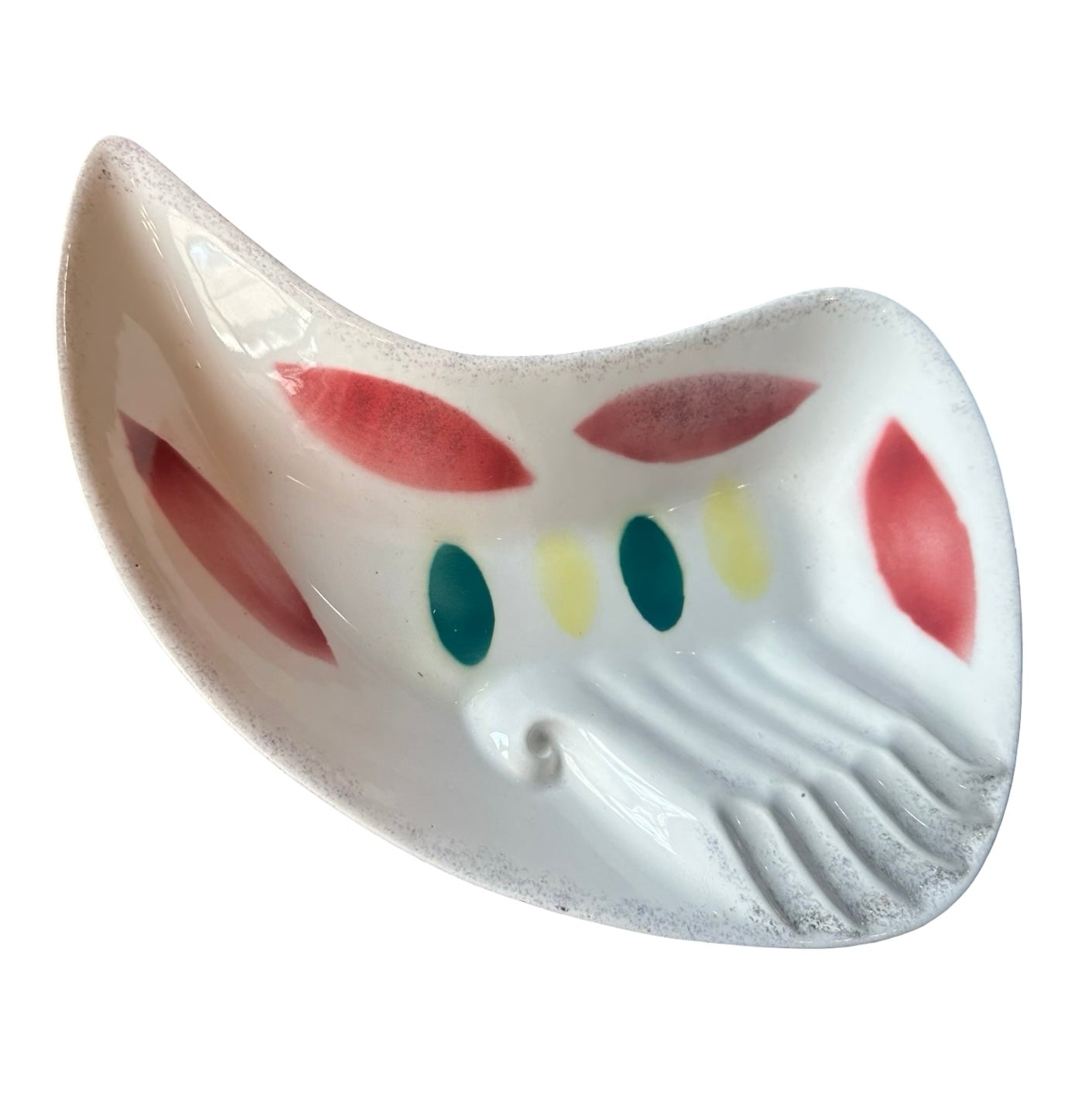 Mid-century boomerang-shaped ashtray by Stone Textile Studio, featuring a sleek ceramic design with a smooth finish.