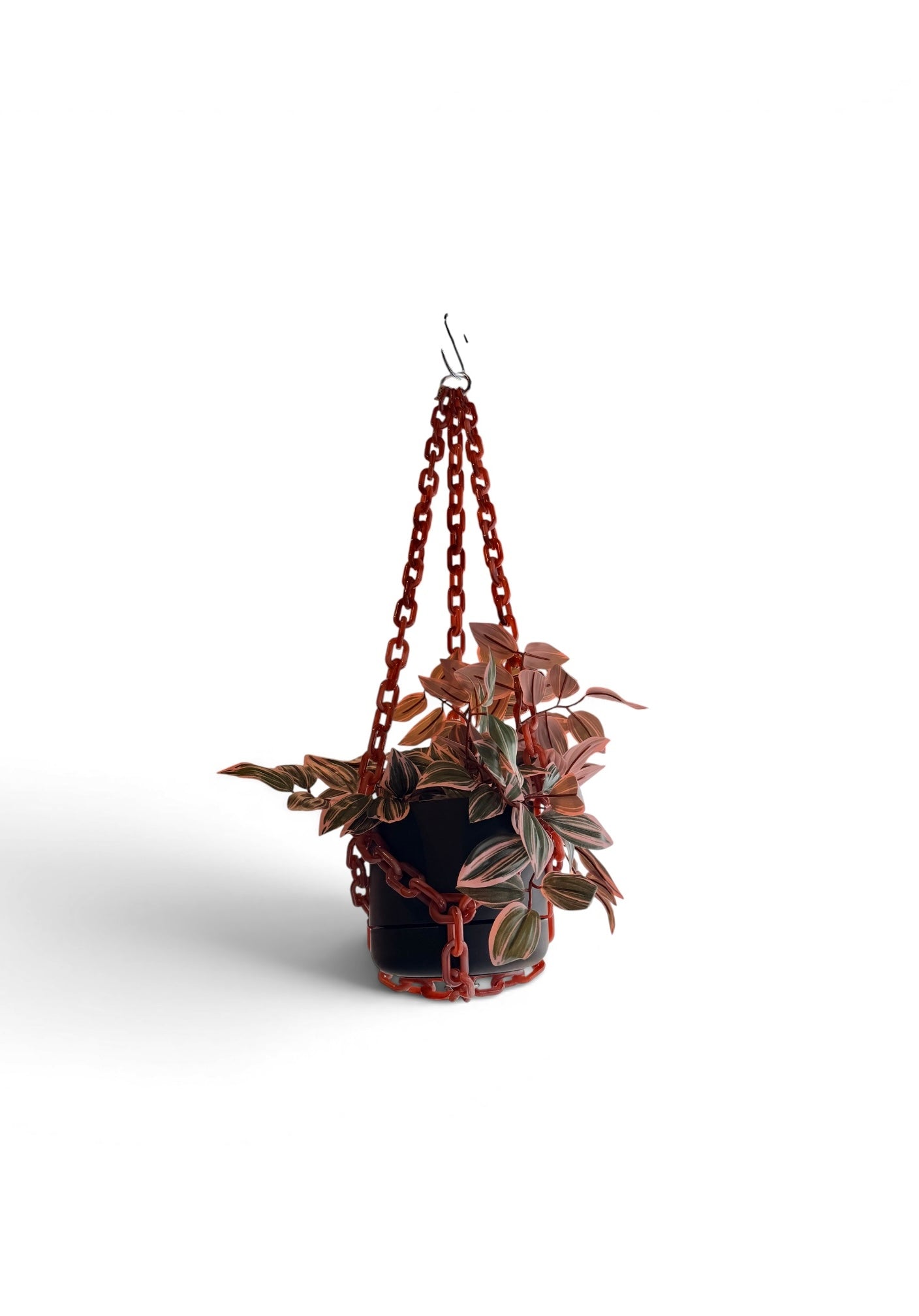 Terracotta hanging planter by The Vault Creative with a rustic finish, suitable for indoor or outdoor plant display.
