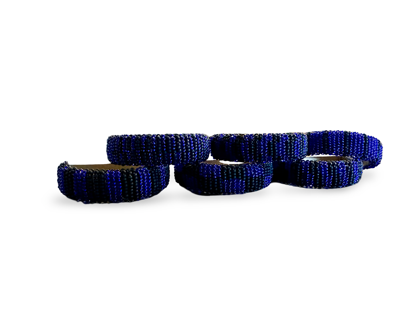Set of six beaded napkin rings from The Vault Creative, featuring colorful handcrafted beads for elegant table settings.