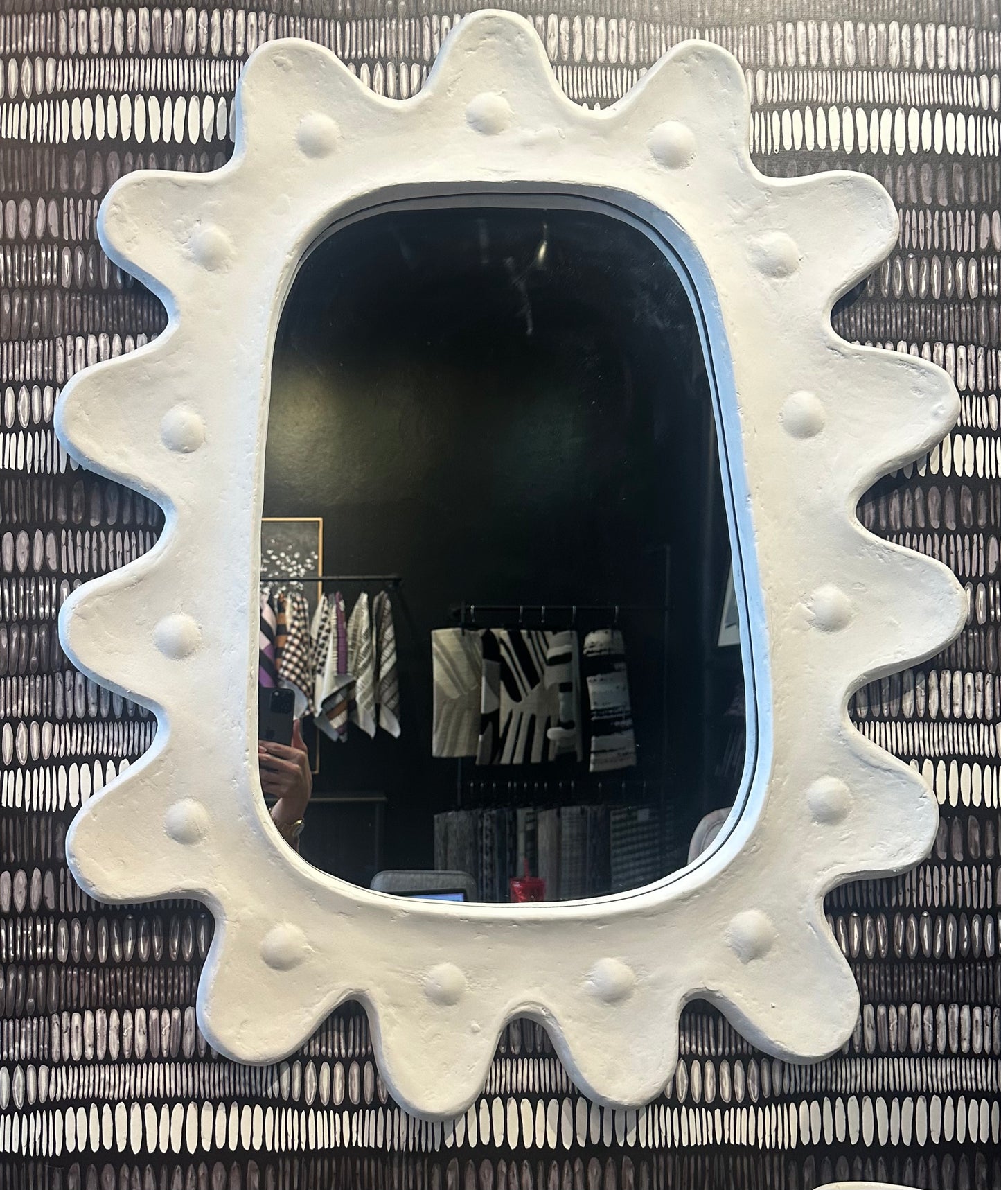 French scallop mirror by ST x OH featuring a decorative scalloped frame and reflective glass surface.