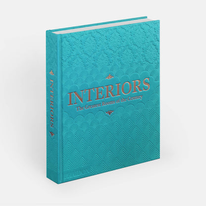 Sky blue cover of Phaidon’s Interiors: The Greatest Rooms of the Century book, featuring an elegant interior design on the cover.