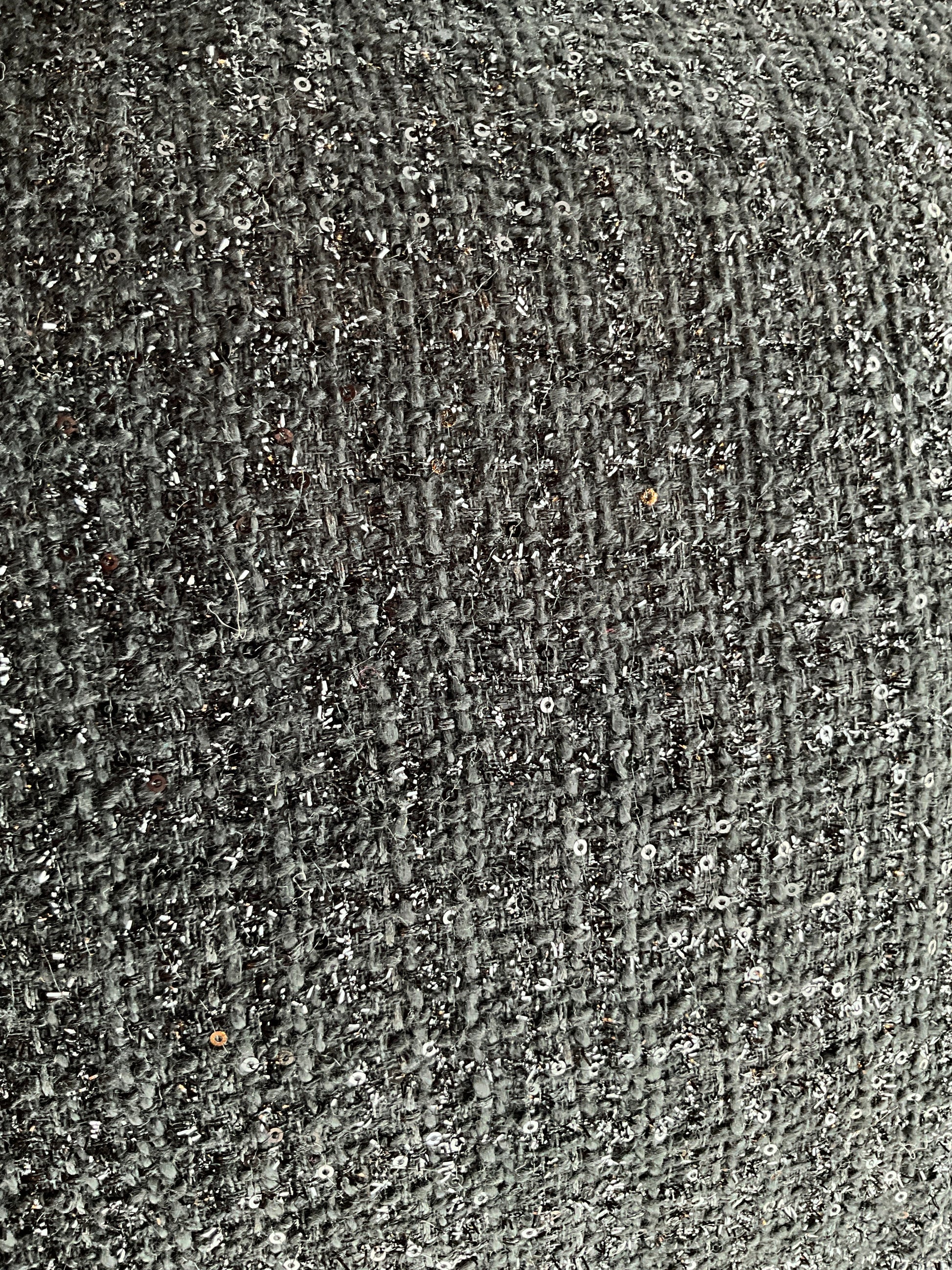 Sequin black tweed pillow by The Vault Creative featuring a shimmering, textured design perfect for stylish home decor.