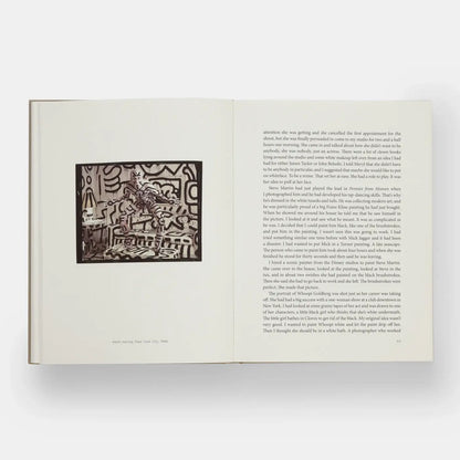Annie Leibovitz At Work book by Phaidon featuring a cover image of photographer Annie Leibovitz on a white background.