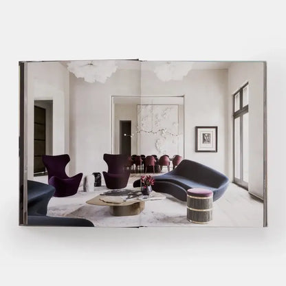 Evoke: Nina Magon book cover by Phaidon featuring modern design and vibrant artwork on a white background
