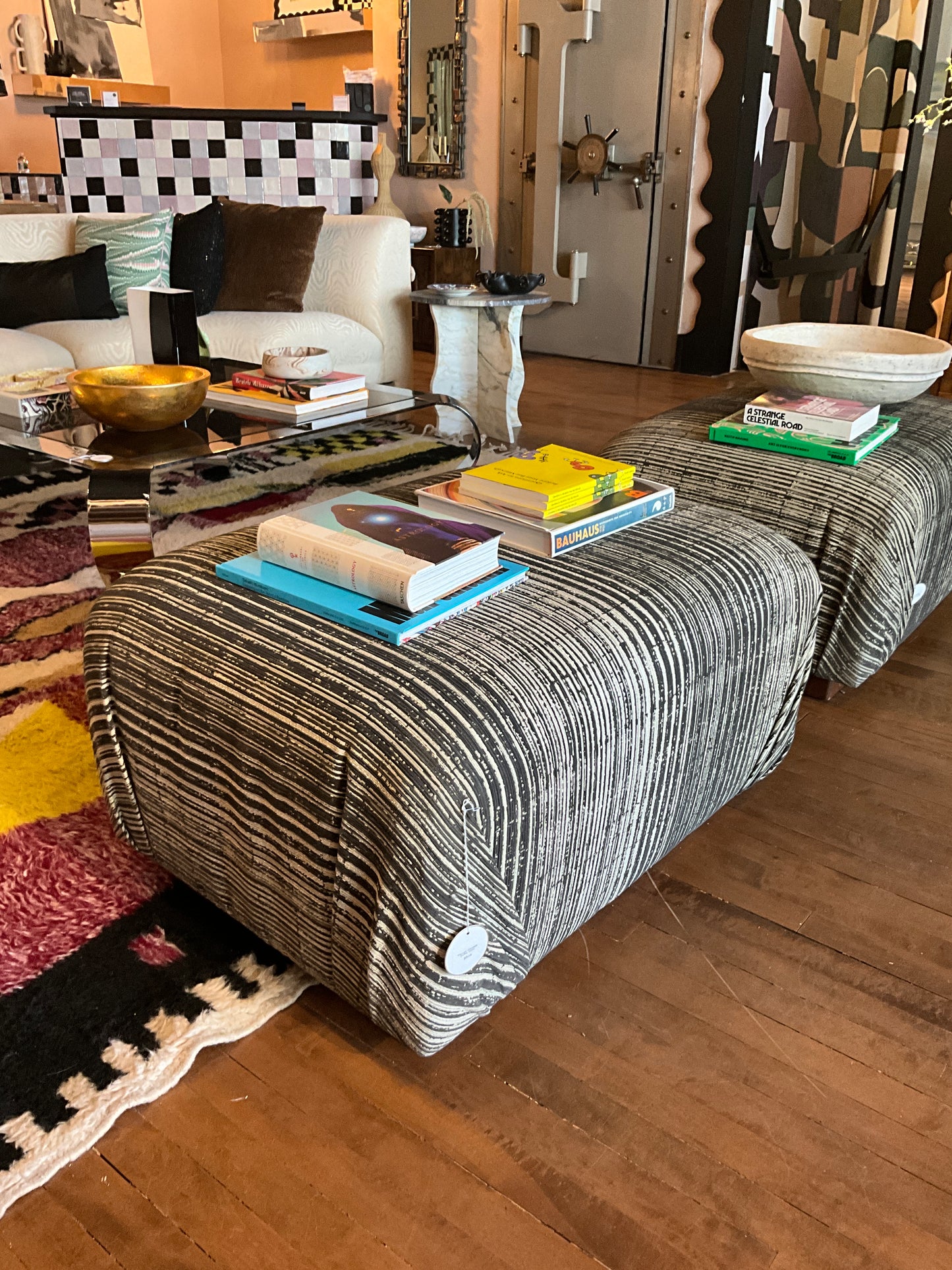Vintage Ottoman Coffee Table by The Vault Creative with wooden top and upholstered base, showcasing a classic, stylish design.