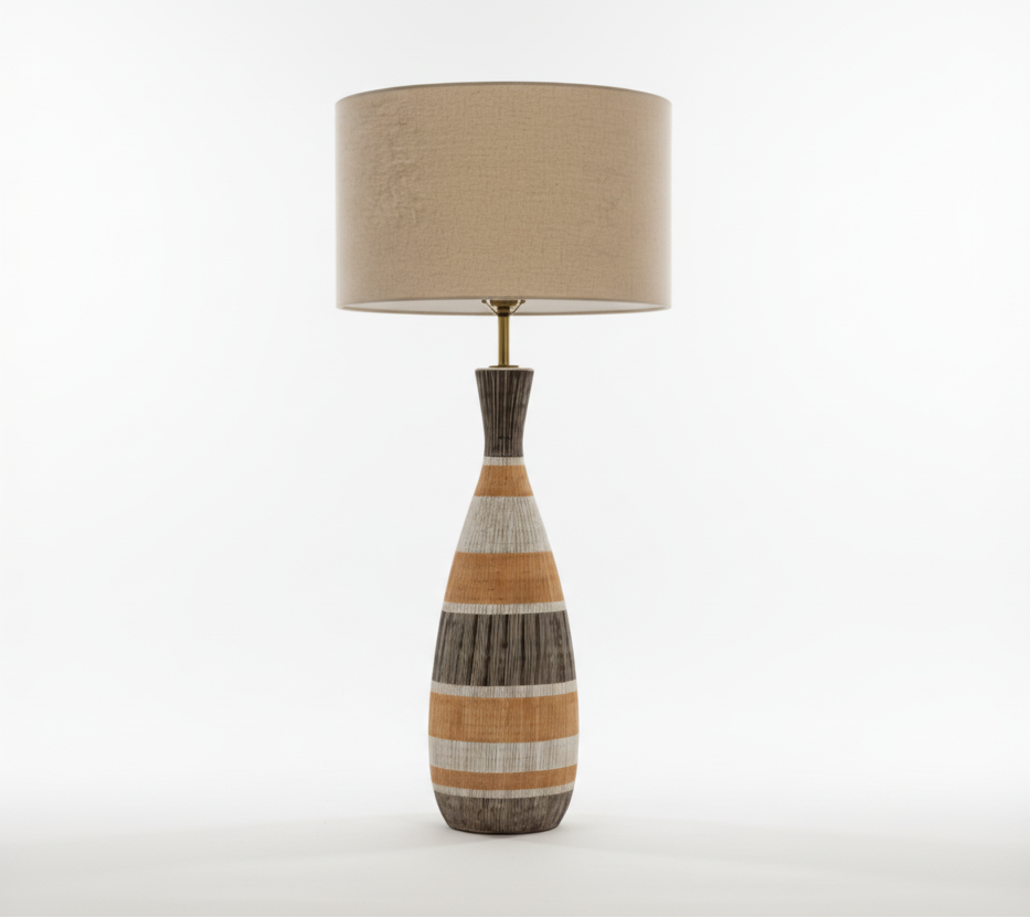Neutral striped tall lamp by The Vault Creative with a modern design and elongated shape, suitable for contemporary home decor.