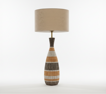 Neutral striped tall lamp by The Vault Creative with a modern design and elongated shape, suitable for contemporary home decor.