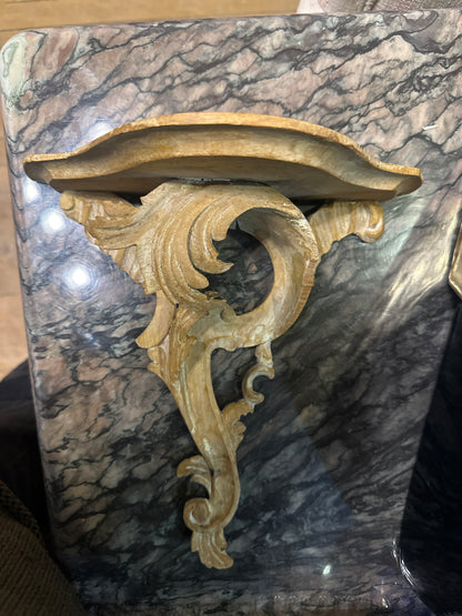 Antique carved shelf by The Vault Creative featuring intricate wood details and a vintage, decorative design.