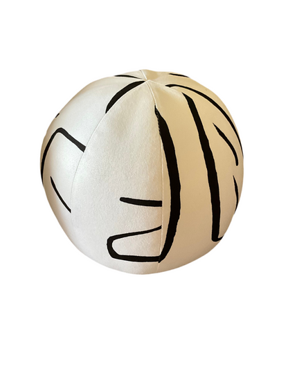 French Ball Pillow by The Vault Creative featuring a plush, round cushion with soft, textured fabric for cozy home decor.