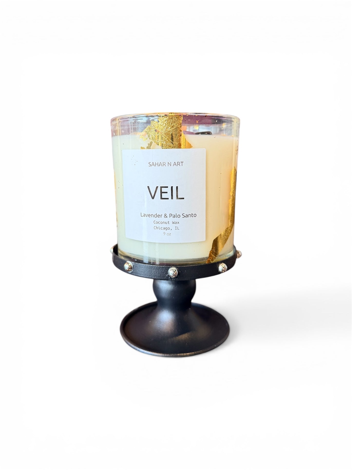The Vault Creative P.Grunsfeld candle holder with a sleek, modern design, perfect for displaying candles on a table or shelf.