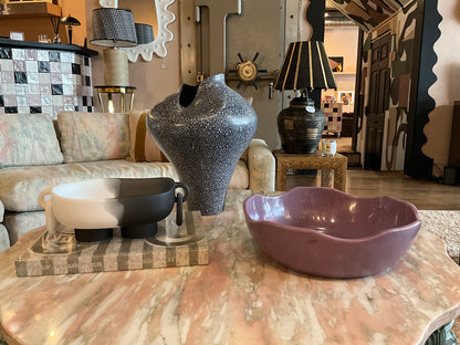 Wavy resin bowl by The Vault Creative featuring a smooth, wavy design and glossy finish, ideal for decorative or functional use.