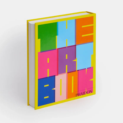 Open art book by Phaidon, revised edition featuring colorful contemporary artworks and detailed illustrations on glossy pages.