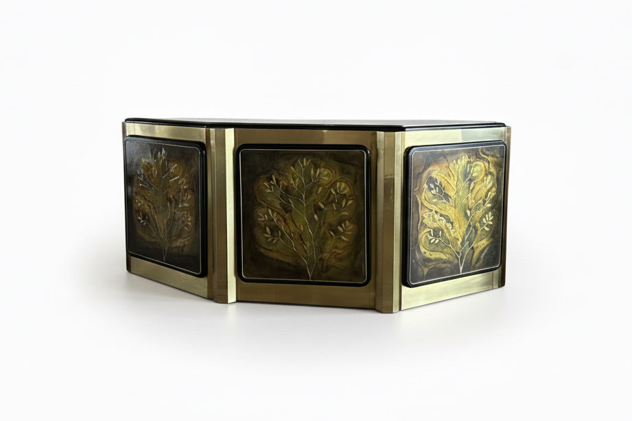 Mastercraft brass Tree of Life cabinet featuring intricate tree design on a polished brass surface.