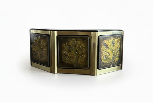 Brass Tree of Life cabinet by The Vault Creative with intricate tree design on the front, showcasing craftsmanship and decorative detail.