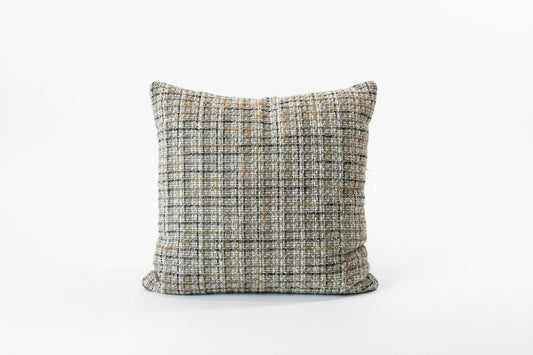 Camel and cream tweed pillow by The Vault Creative featuring textured fabric and classic design for cozy home decor.