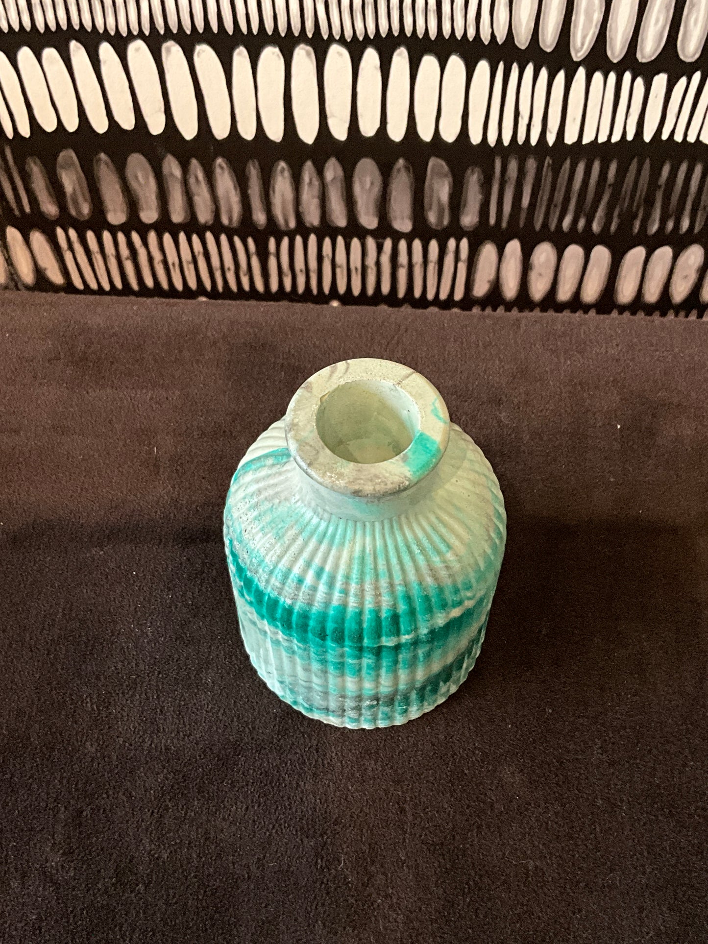Emerald marble tabletop jar by Stone Textile Studio, featuring a glossy green and black marbled design for decorative storage.
