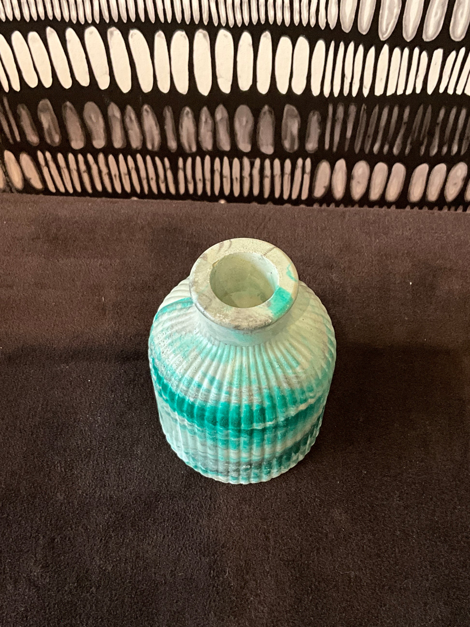 Emerald marble tabletop jar by Stone Textile Studio, featuring a glossy green and black marbled design for decorative storage.