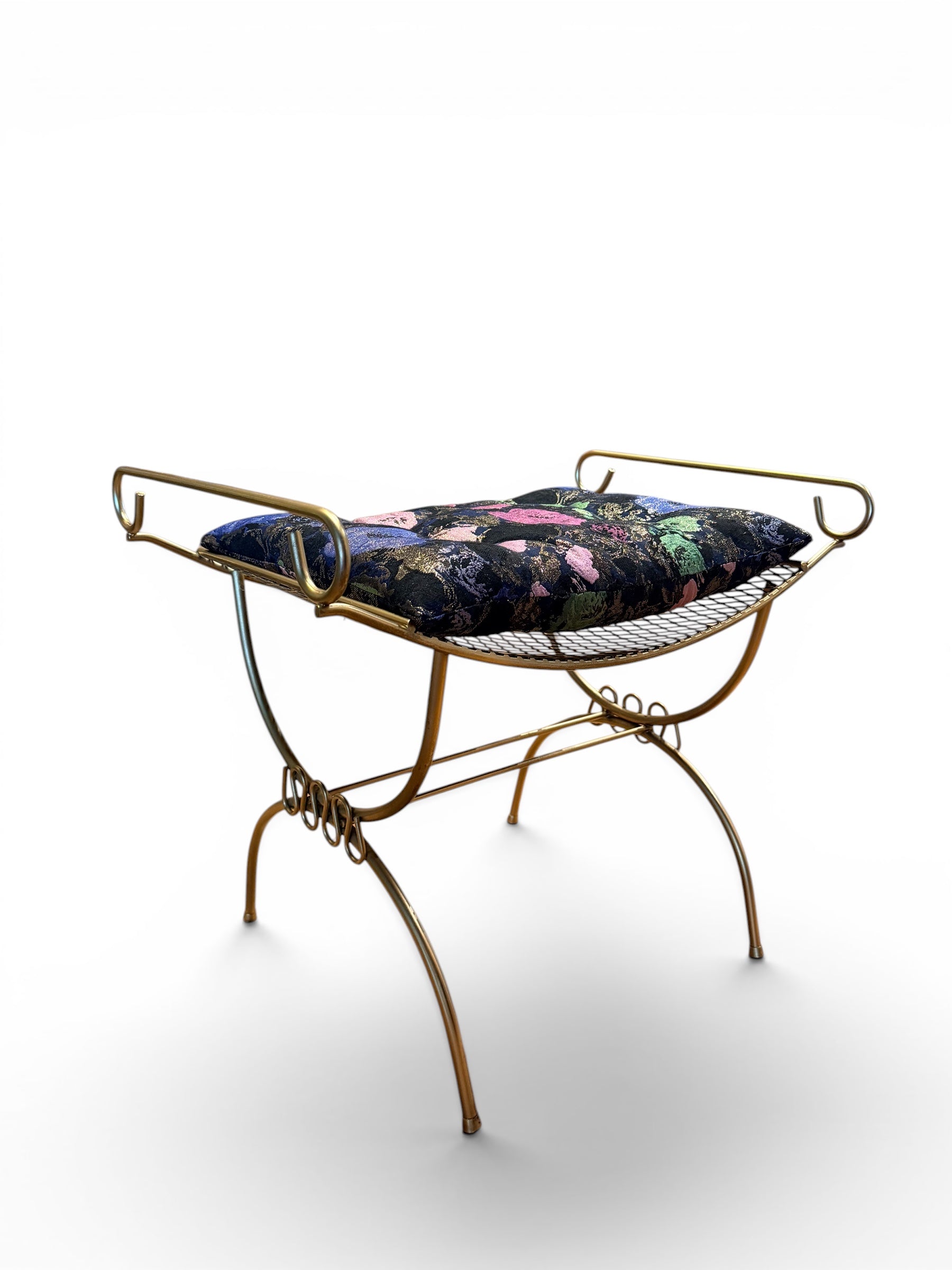 Vintage gold vanity bench with ornate legs and cushioned seat by The Vault Creative, perfect for elegant bedroom décor.