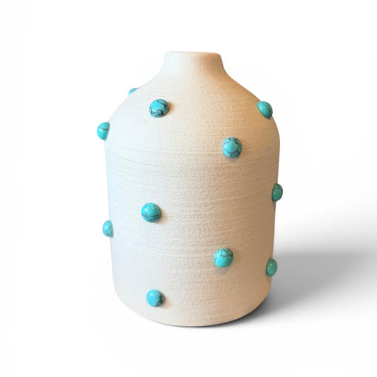 Sandy turquoise ceramic vase by P. Grunsfeld from The Vault Creative, featuring a smooth, rounded shape and artisanal finish.