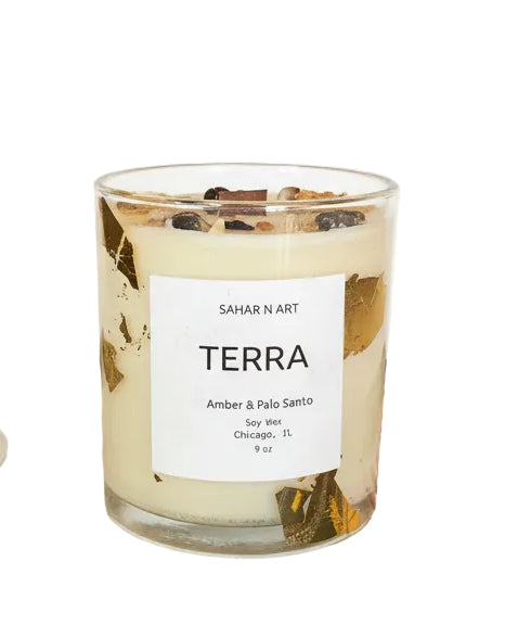 Ozmun Home Sahar N Art Candle with intricate decorative design and warm glow, perfect for home ambiance.