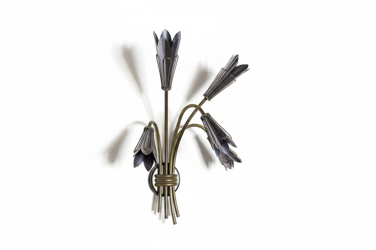Pair of vintage French flower sconces with ornate metal detailing and floral accents, ideal for classic interior decor.