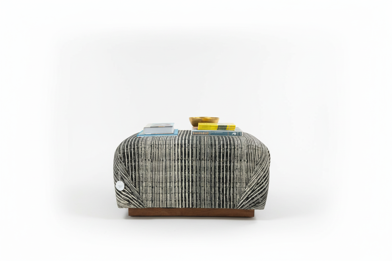 Vintage Ottoman Coffee Table by The Vault Creative with wooden top and carved base, ideal for living room decor.