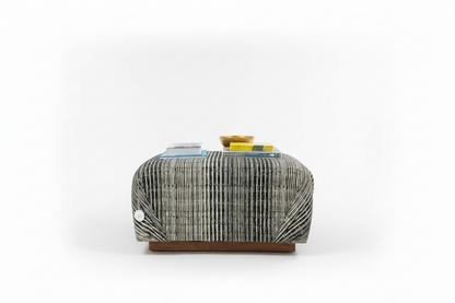 Vintage Ottoman Coffee Table by The Vault Creative with wooden top and carved base, ideal for living room decor.