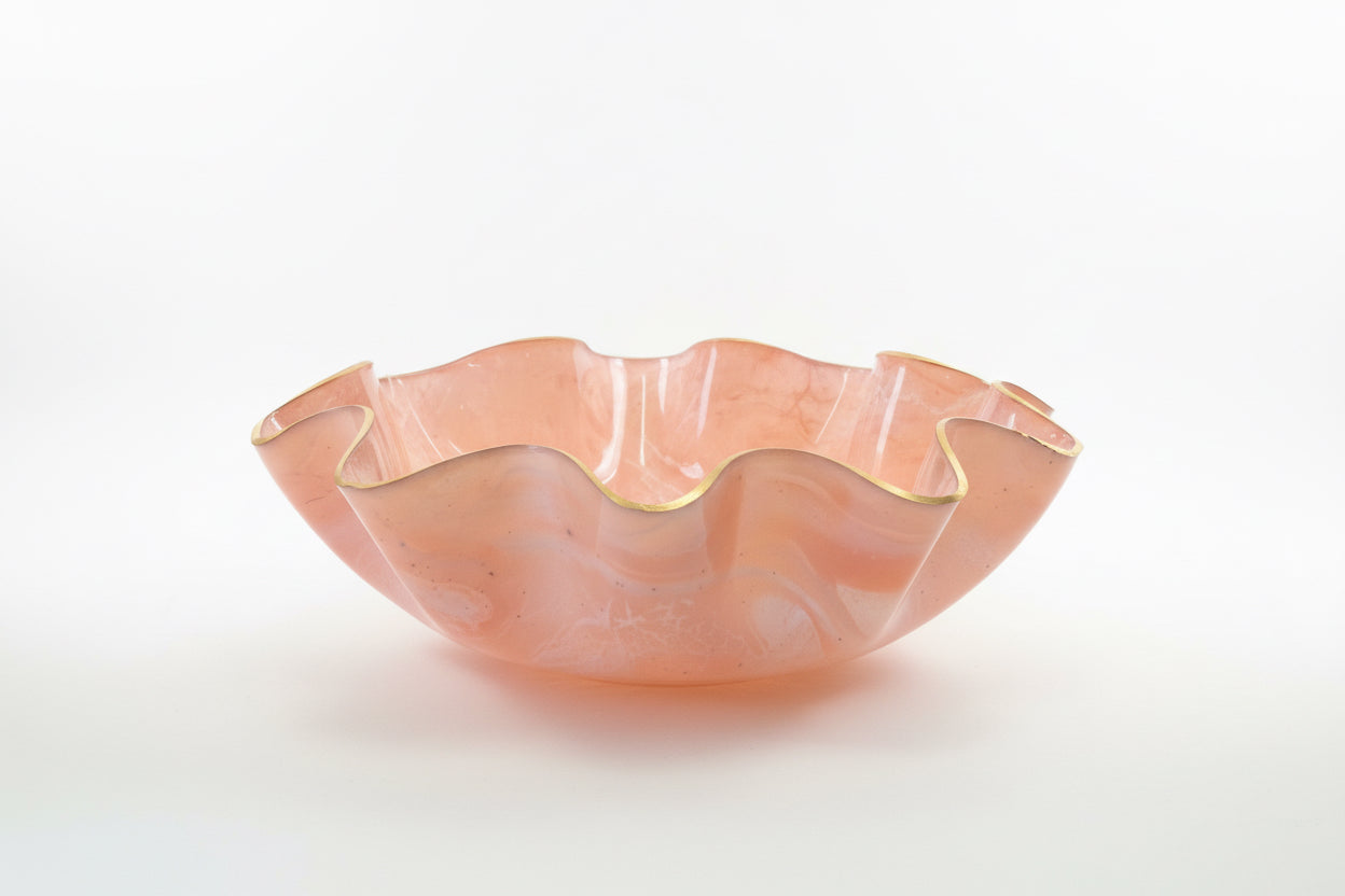 Big pink gemstone resin bowl by The Vault Creative, showcasing a vibrant pink and glossy finish with smooth, rounded edges.