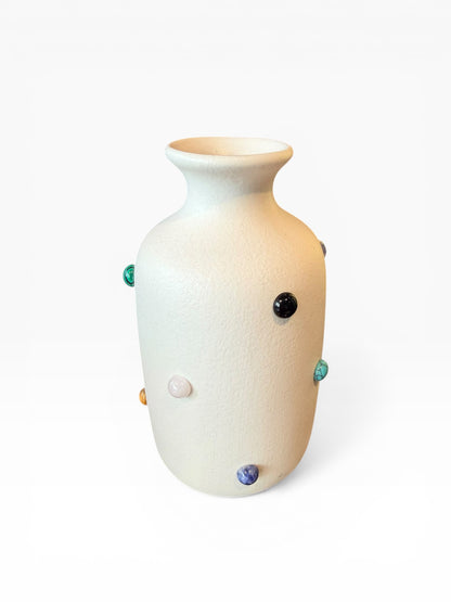 Marcia Bud Vase by P.Grunsfeld from The Vault Creative, ceramic with a sleek modern design, shown with a minimalist background.