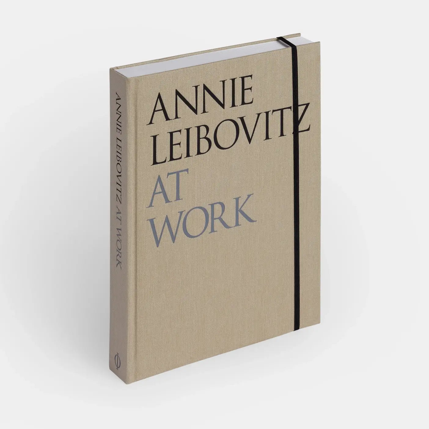 An image of the "Annie Leibovitz At Work" book by Phaidon, showing the cover with a portrait of Annie Leibovitz.
