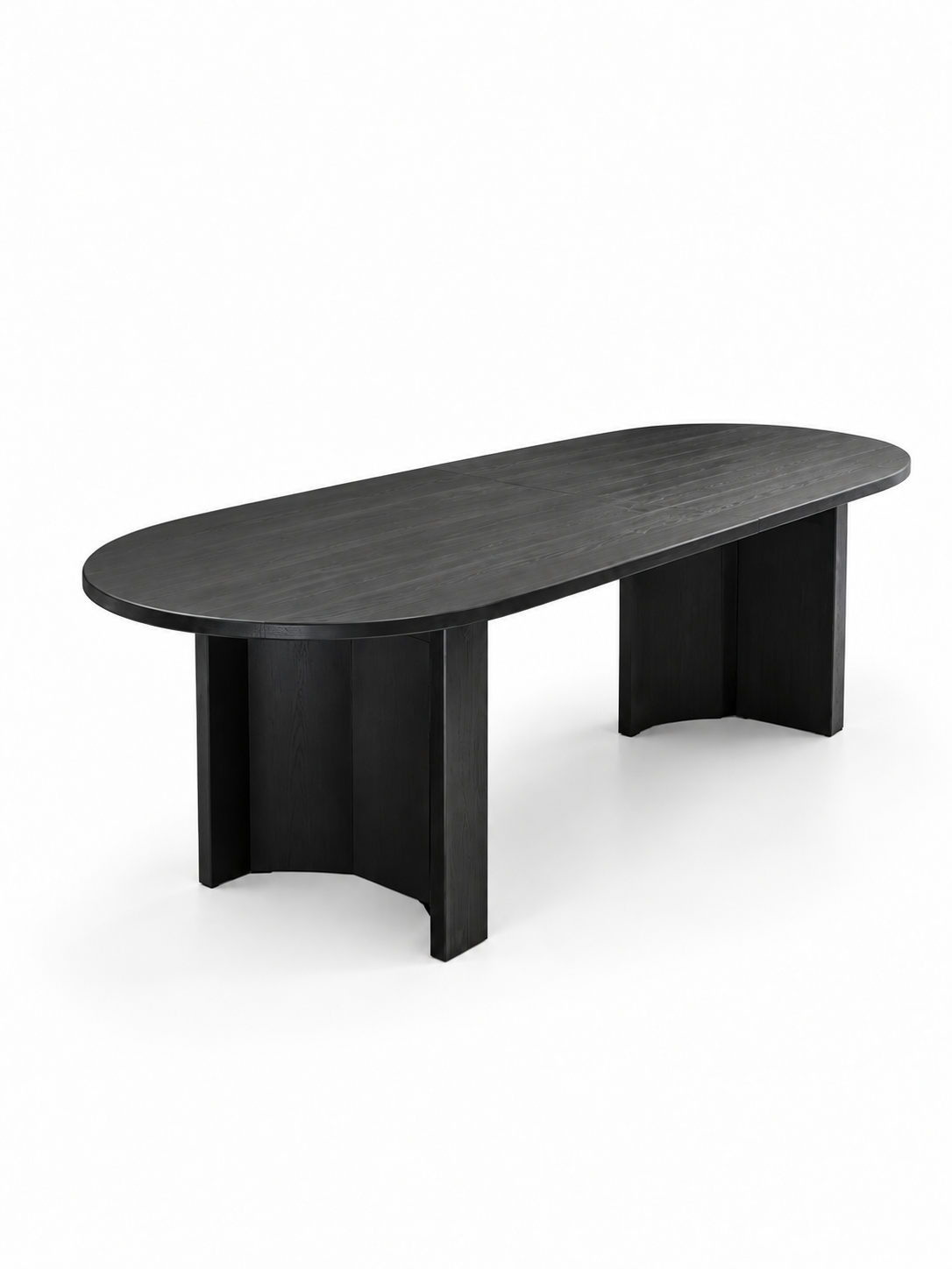 Black oval double pedestal dining table by The Vault Creative with smooth surface and sturdy base, ideal for modern dining spaces.