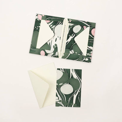 Green hand marbled greeting card set by Craft Boat with eight unique, artistic marbled designs on textured paper.