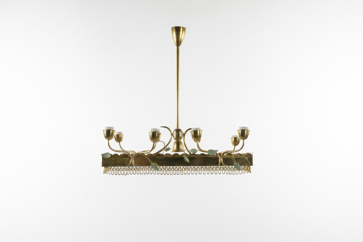 Vintage French Leaves Pendant Light by The Vault Creative featuring a decorative leaf design and warm lighting.