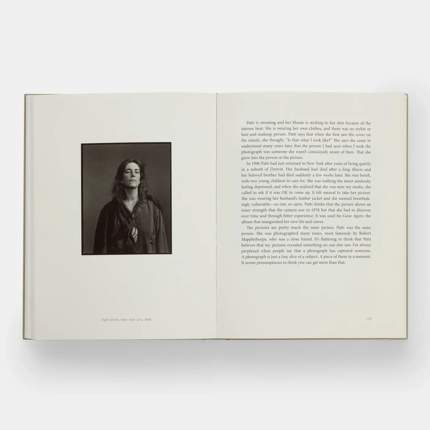 Annie Leibovitz At Work book by Phaidon featuring a close-up of the book cover with photography artwork and title.