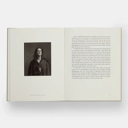 Annie Leibovitz At Work book by Phaidon featuring a close-up of the book cover with photography artwork and title.