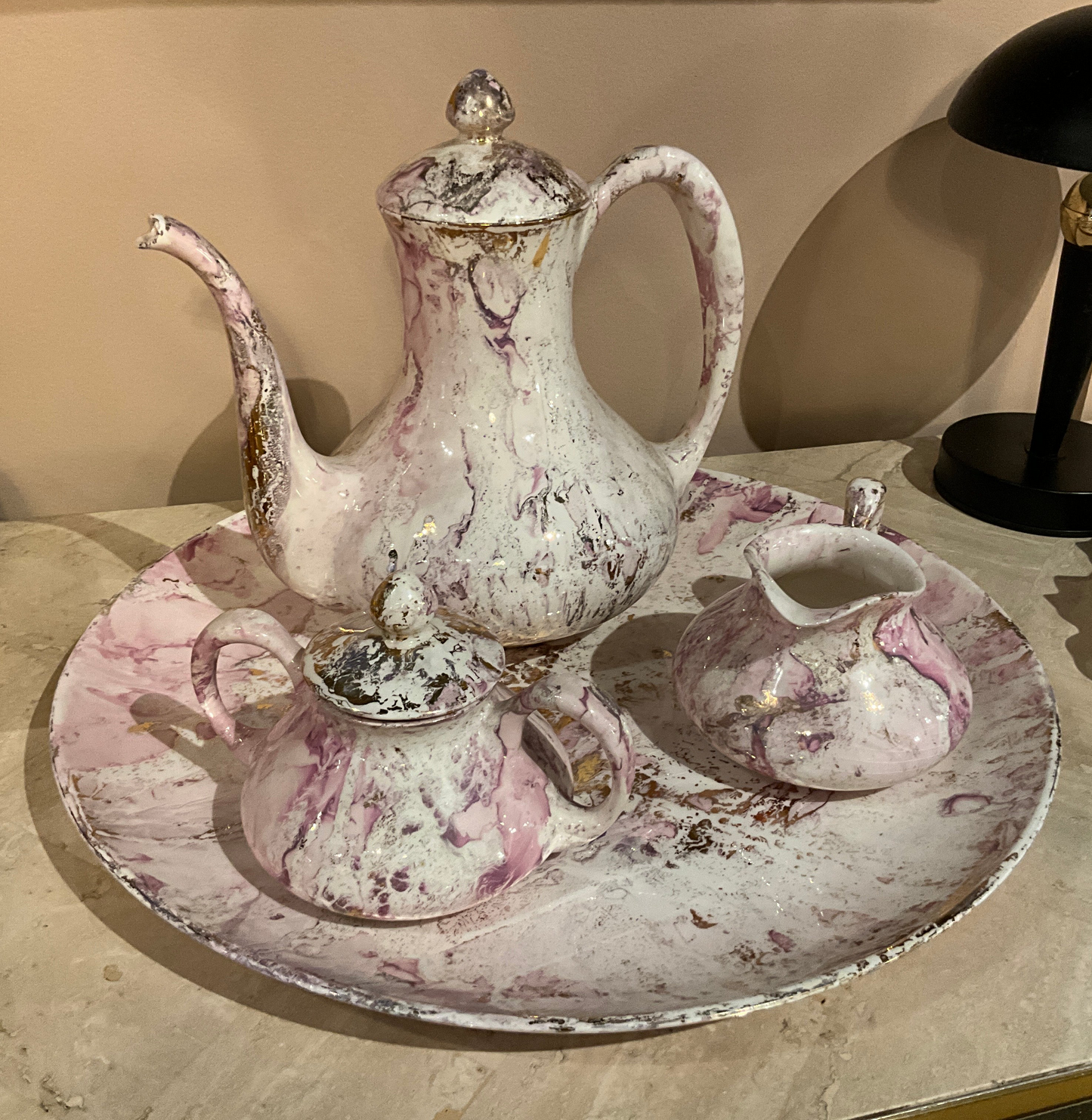 Sascha Brastoff tea set with colorful ceramic cups and teapot, vintage-style design from The Vault Creative collection.