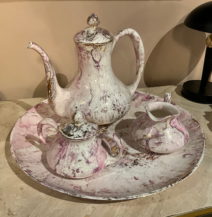 Sascha Brastoff tea set with colorful ceramic cups and teapot, vintage-style design from The Vault Creative collection.