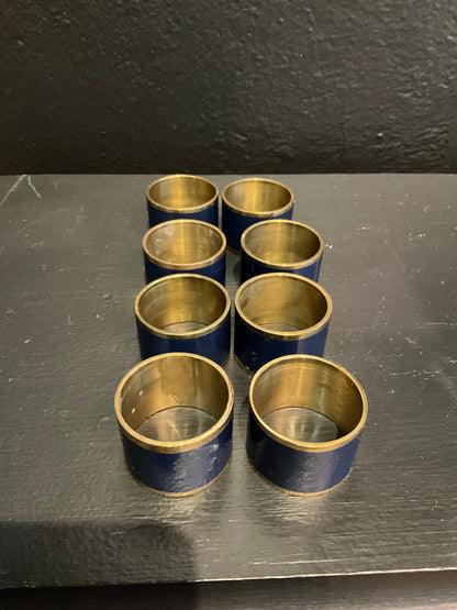 French brass and enamel napkin rings by Elizabeth, featuring intricate design and colorful enamel accents for elegant table settings.