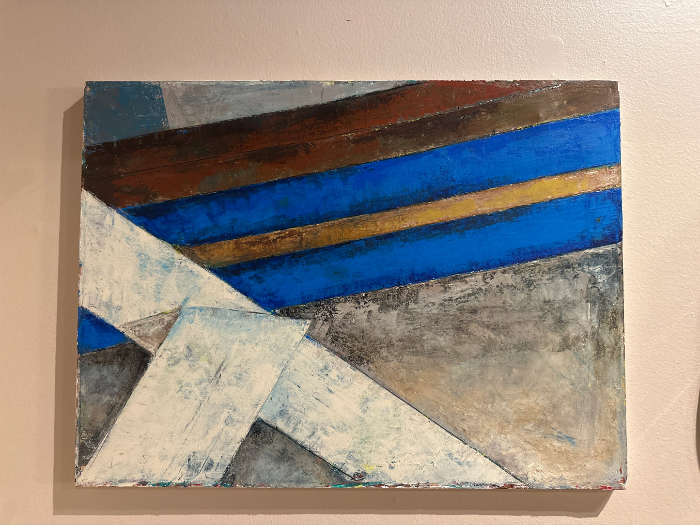 Blue stripe abstract art by The Vault Creative featuring bold blue and white brushstrokes on canvas.