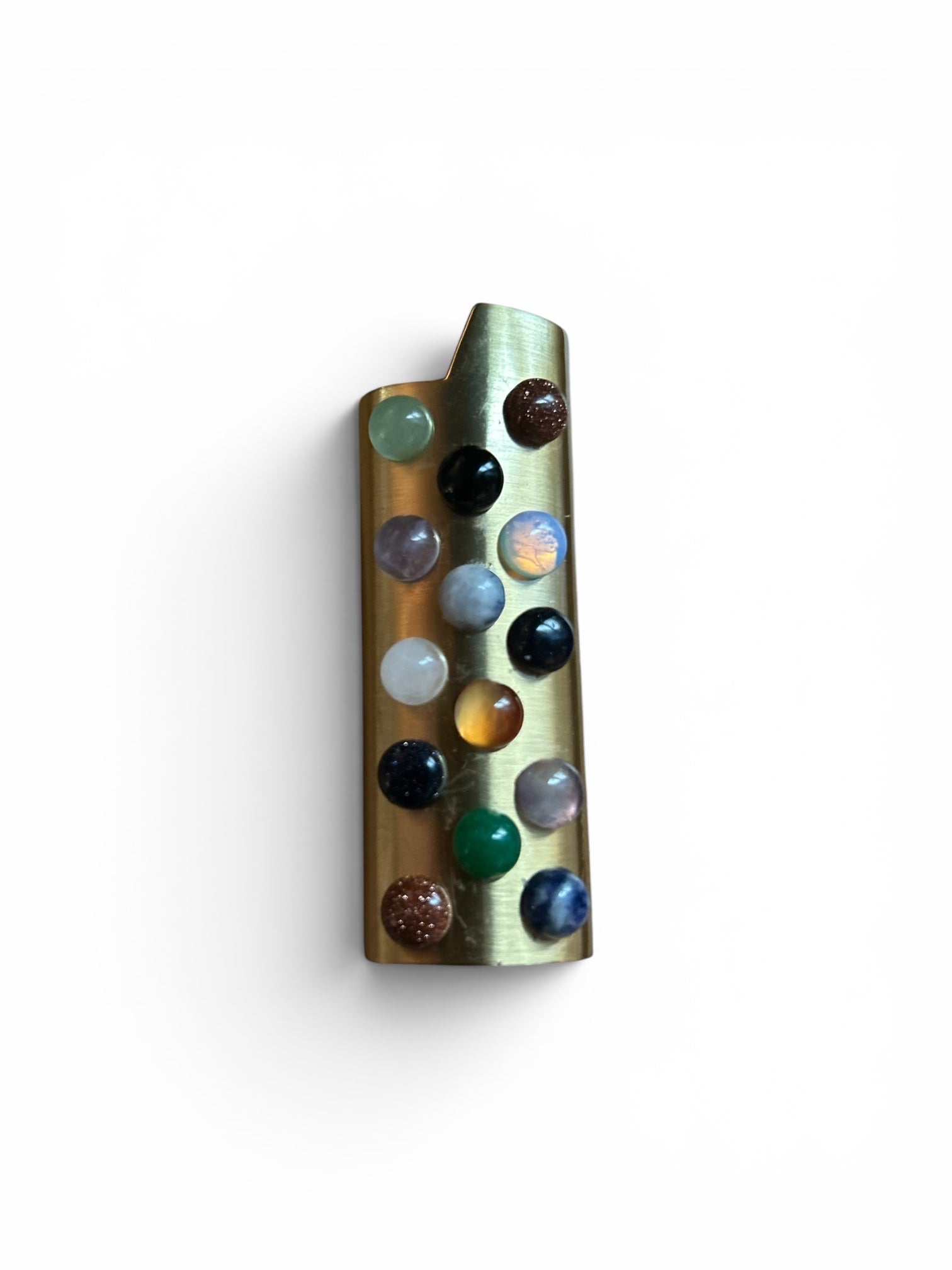 P. Grunsfeld Stoner Lazy Lighter by The Vault Creative, featuring a sleek metal design and ergonomic handle for easy lighting.