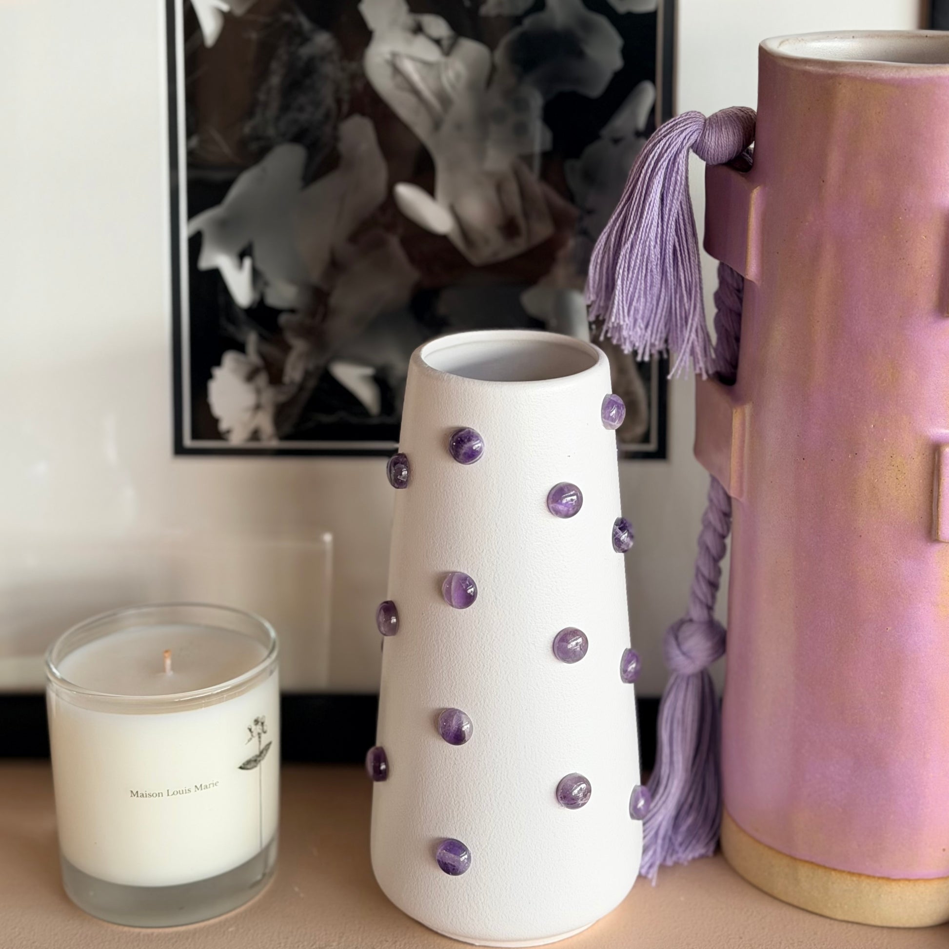 Amethyst stone 8-inch vase by The Vault Creative, featuring a polished purple amethyst design with a smooth, rounded shape.