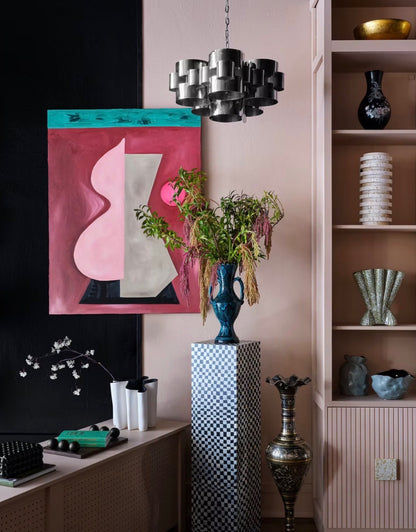 Vintage Moroccan teal vase with intricate patterns, crafted by The Vault Creative, displayed on a neutral background.