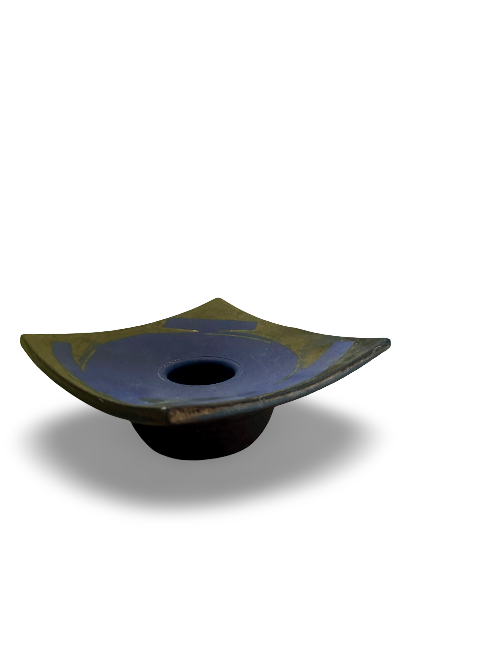 Abstract ceramic vessel by The Vault Creative featuring a smooth, rounded shape with earthy tones and glossy finish.
