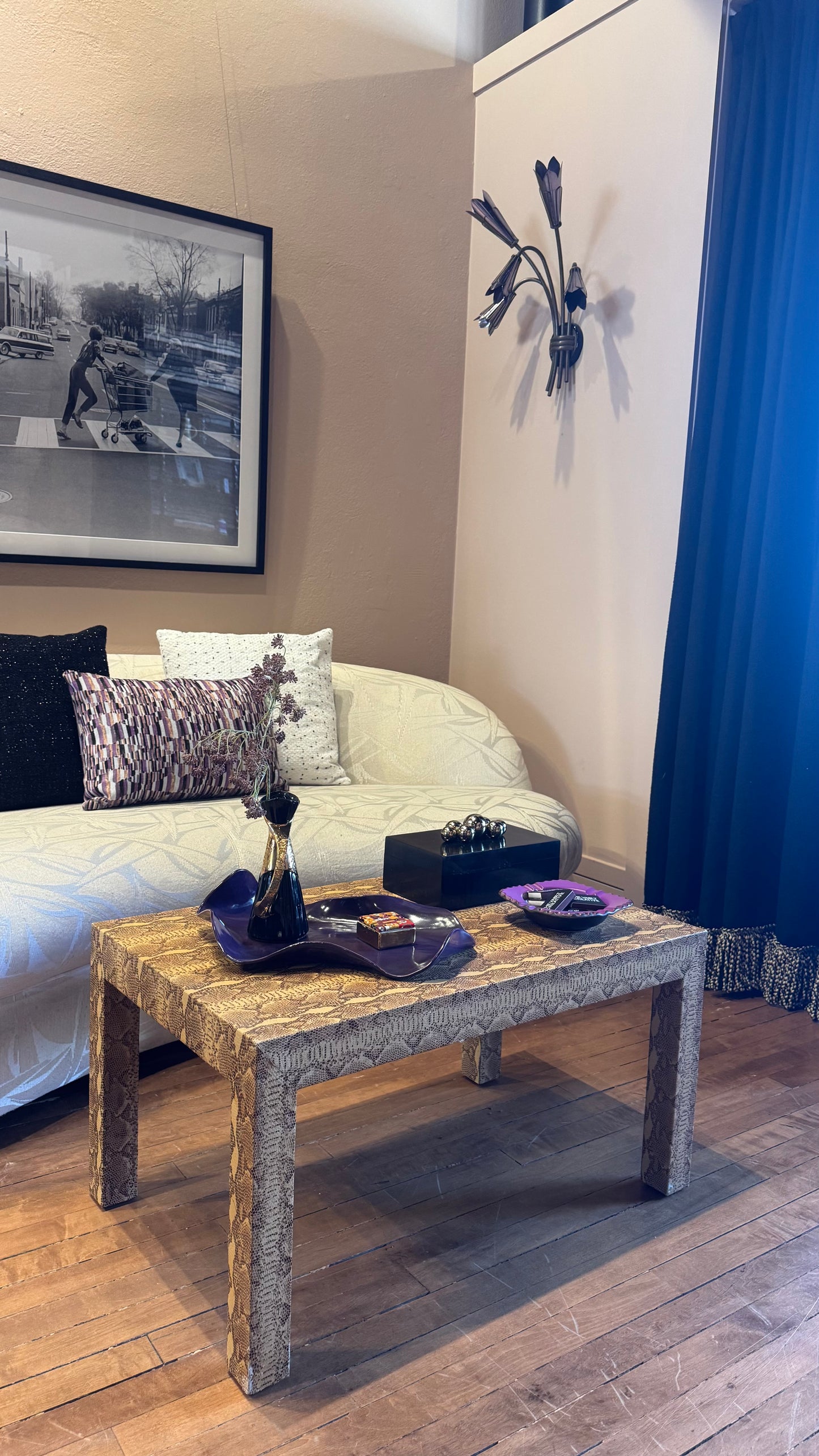 Vintage custom snakeskin coffee table by The Vault Creative, featuring a sleek rectangular design with textured snakeskin surface.