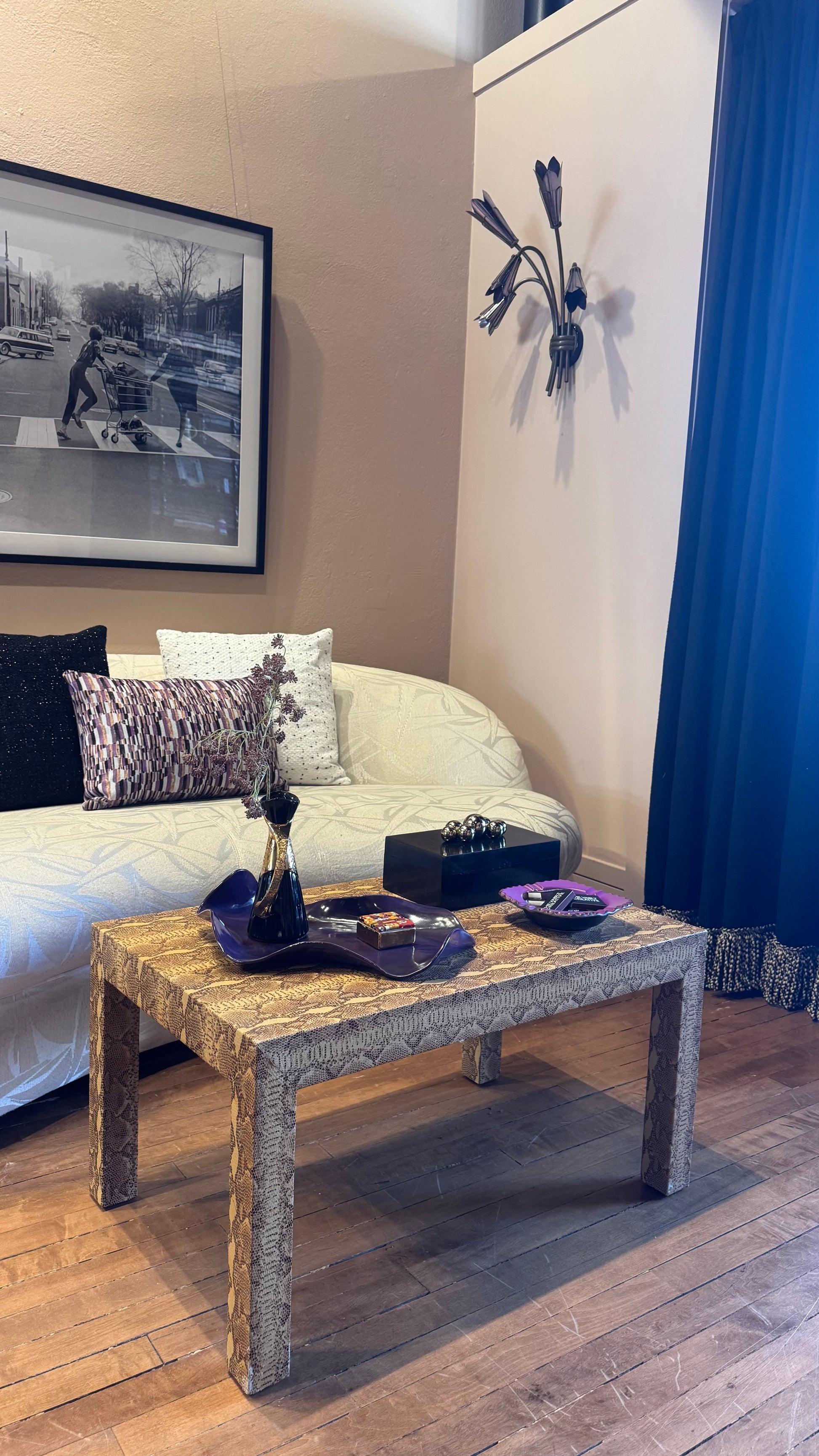 Vintage custom snakeskin coffee table by The Vault Creative, featuring a sleek rectangular design with textured snakeskin surface.