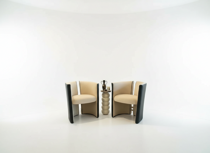 Stylish mohair and leather split back chair by The Vault Creative, featuring a modern design with plush upholstery and wooden legs.