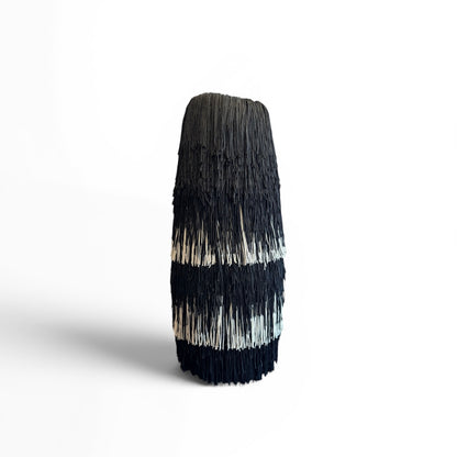 Amber Rene Hansen Eloise ARH Fringe Vase, with a modern design and fringe details, displayed on a neutral background.